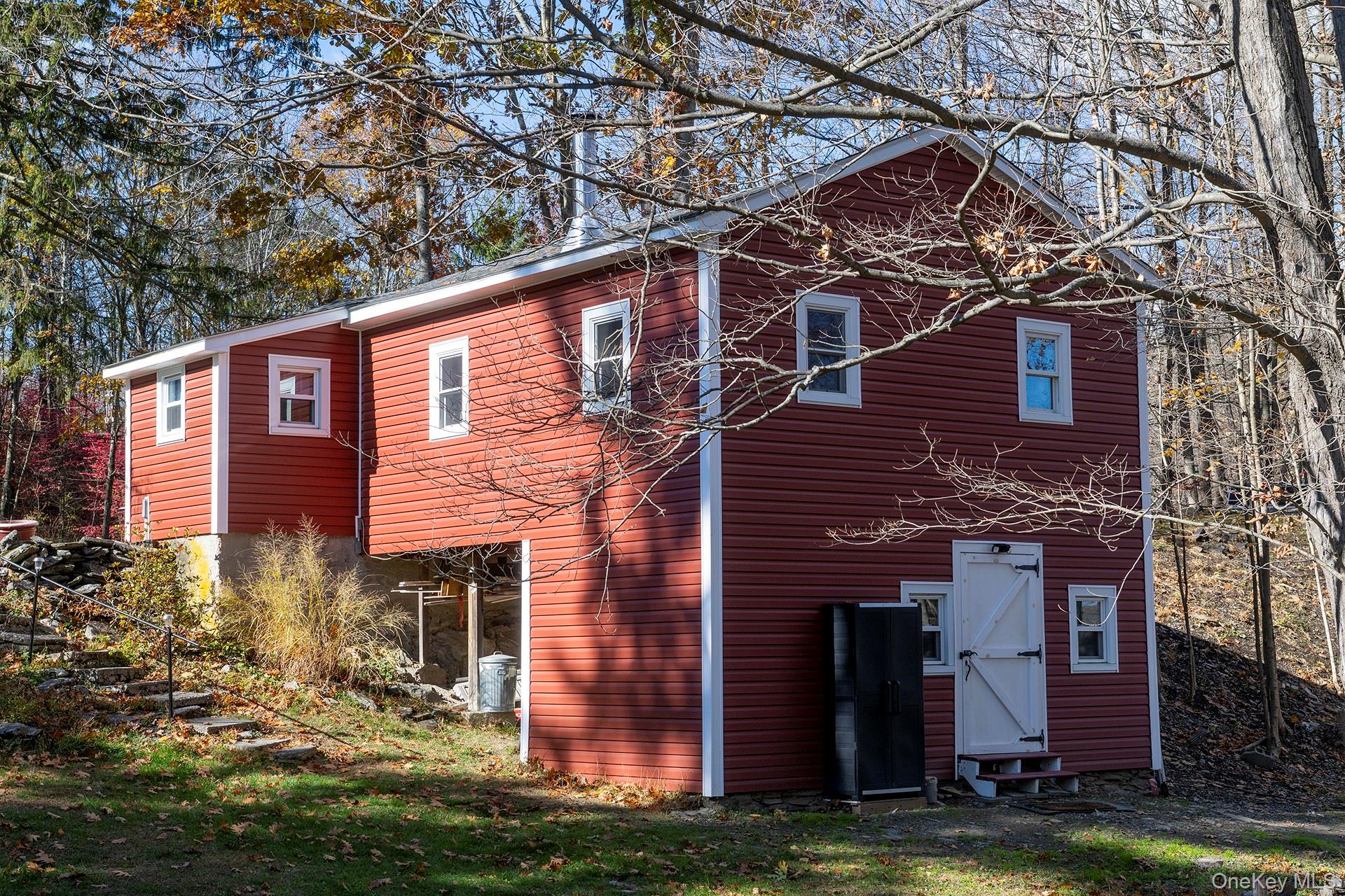 145 Drake Road Pleasant Valley, NY 12569 - Photo 32 of 47 front view of a house with a yard
