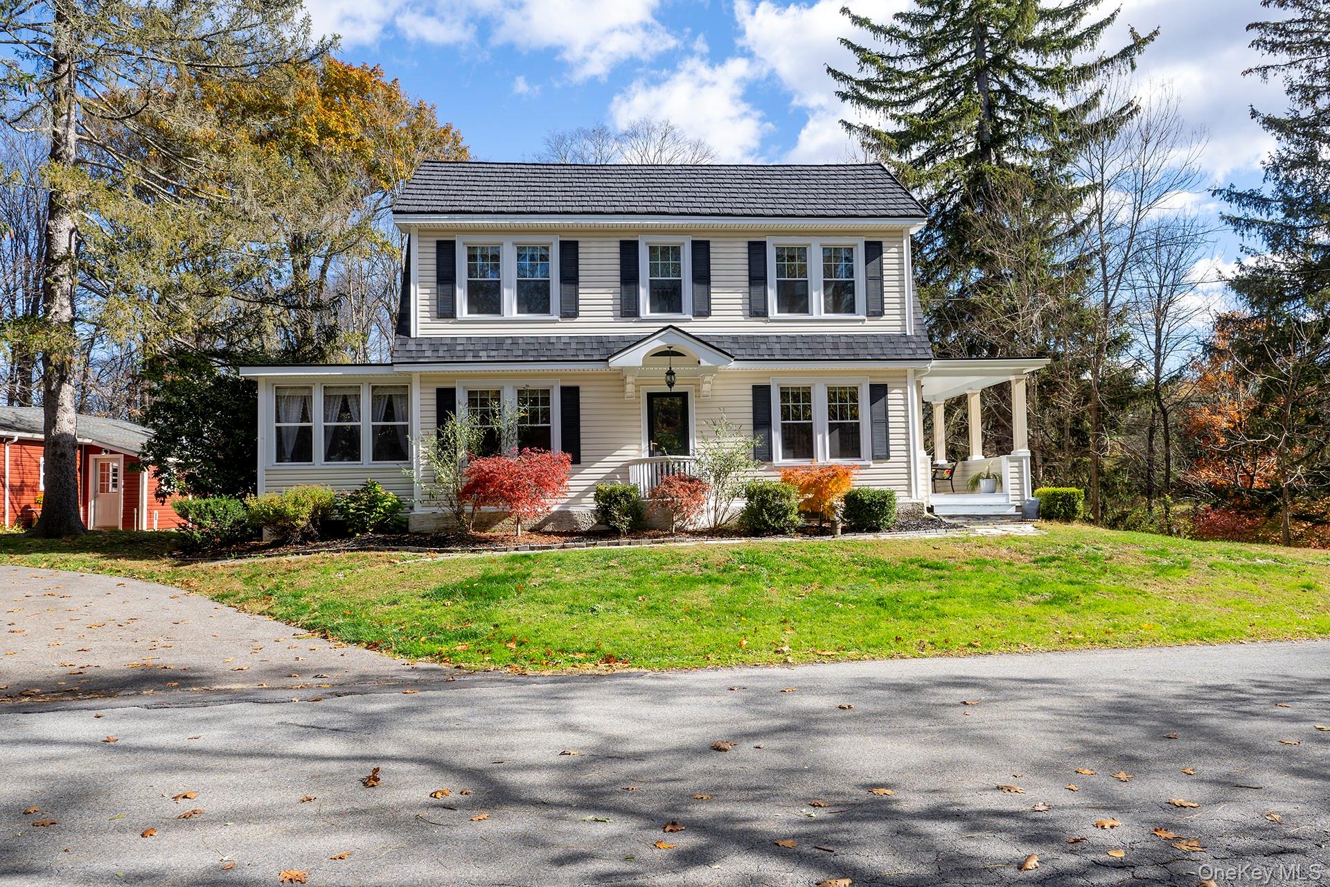 145 Drake Road Pleasant Valley, NY 12569 - Photo 35 of 47 a front view of a house with a garden