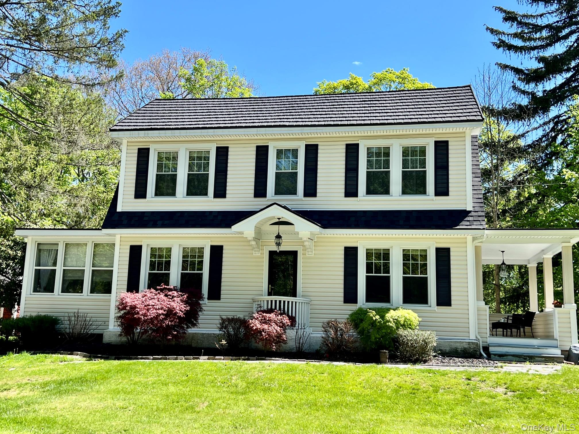 145 Drake Road Pleasant Valley, NY 12569 - Photo 42 of 47 a front view of a house with garden