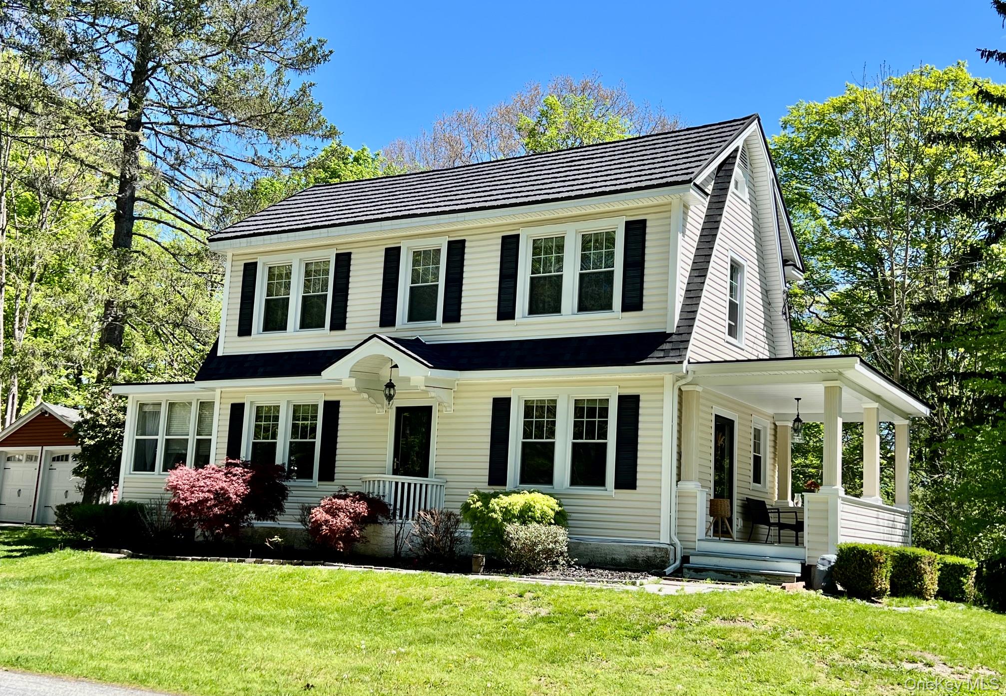 145 Drake Road Pleasant Valley, NY 12569 - Photo 43 of 47 a front view of a house with a yard