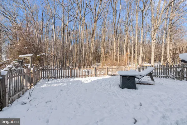 a view of outdoor space with garden and deck