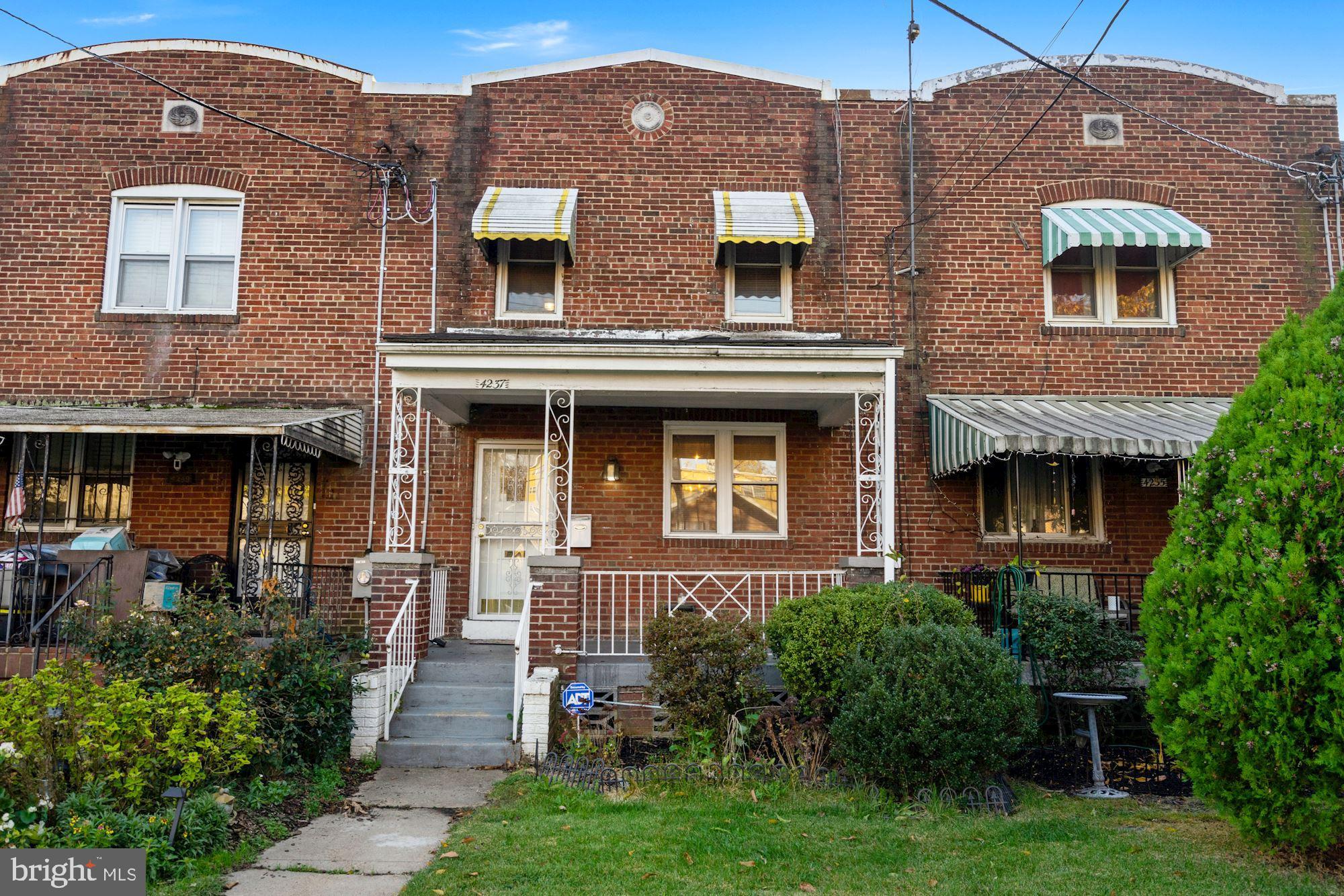 4237 Benning Road Northeast Washington, DC 20019 - Photo 1 of 28 Classic DC Brick Rowhouse