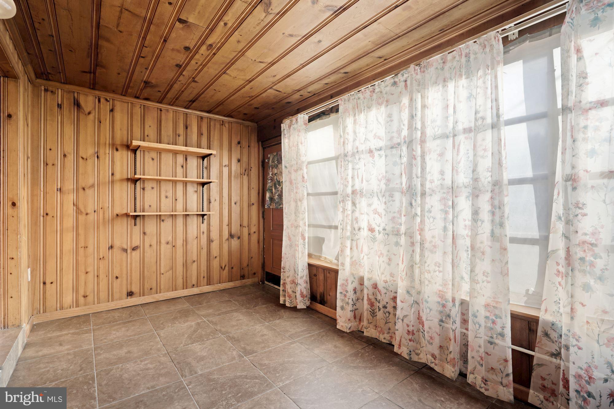 4237 Benning Road Northeast Washington, DC 20019 - Photo 11 of 28 Enclosed Back Porch