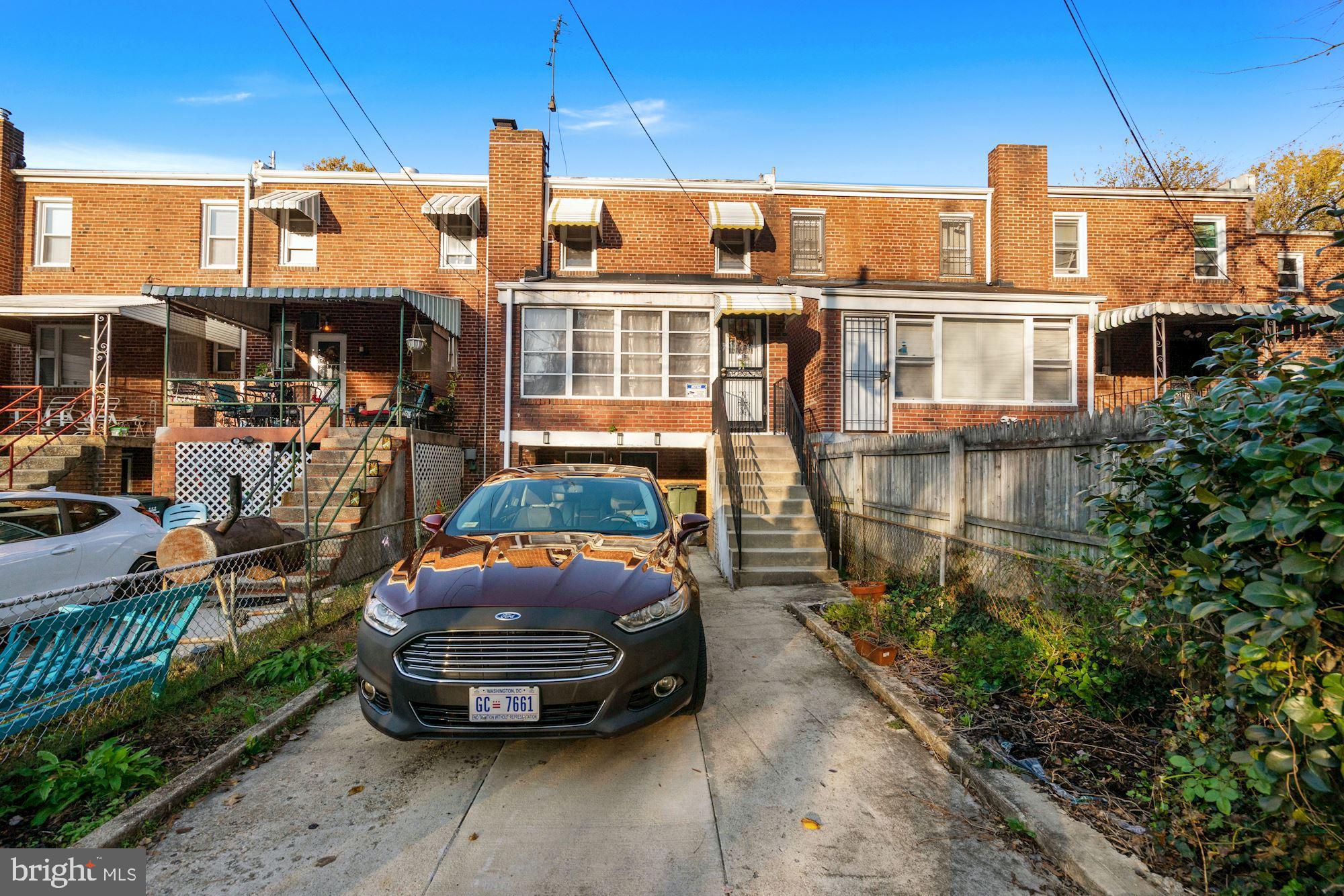 4237 Benning Road Northeast Washington, DC 20019 - Photo 24 of 28 Off-street parking in driveway