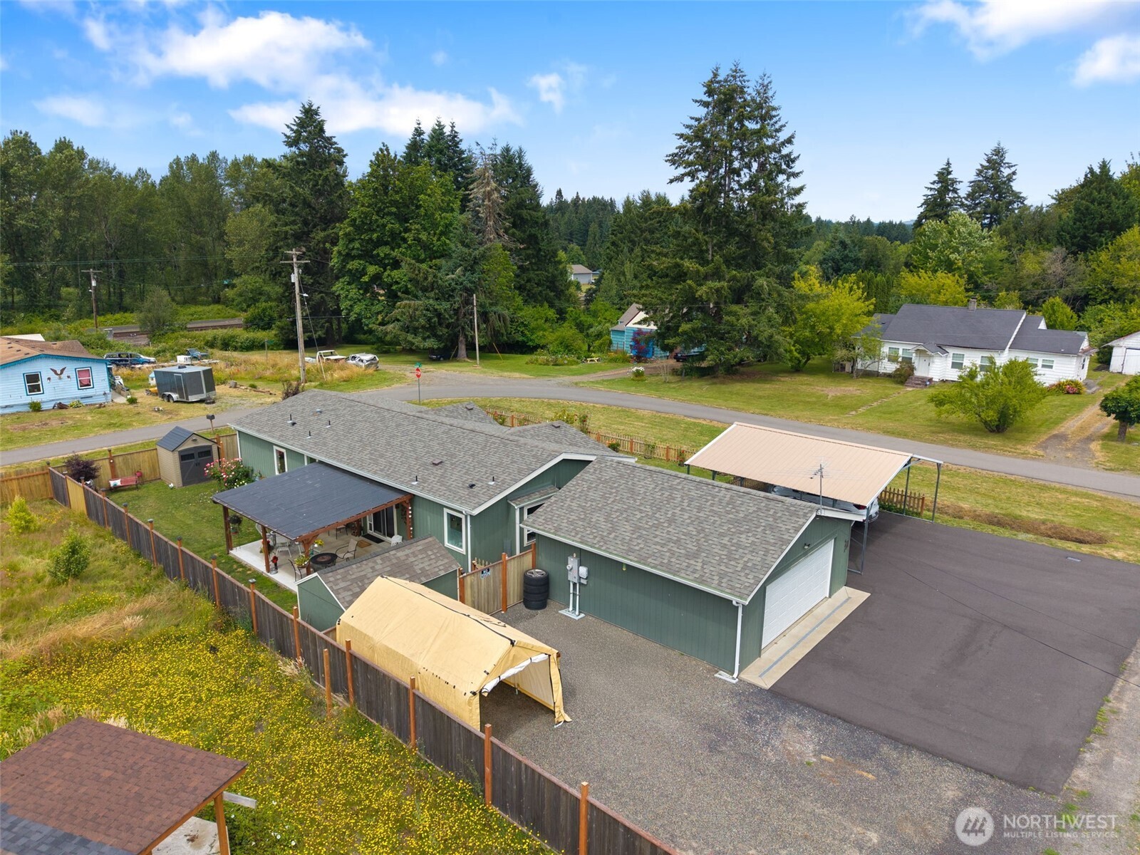 608 Main Street Vader, WA 98593 - Photo 34 of 37 a view of a patio with swimming pool