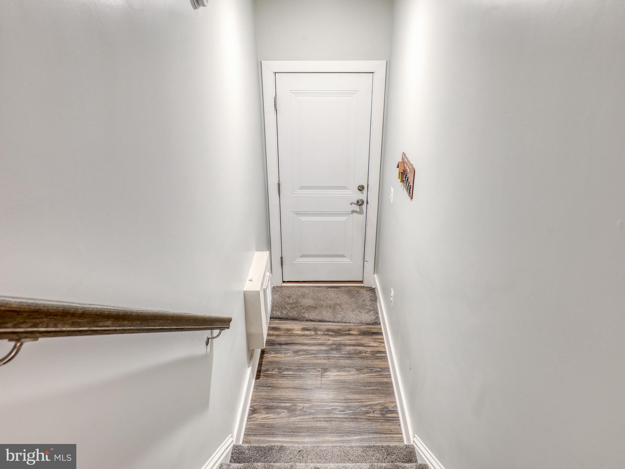 44852 Tiverton Square Ashburn, VA 20147 - Photo 10 of 45 Stairway from front door & garage