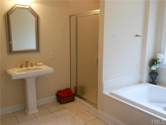 741 Gold Sand Road Louisburg, NC 27549 - Photo 12 of 25 Jetted tub and separate shower in the master bath