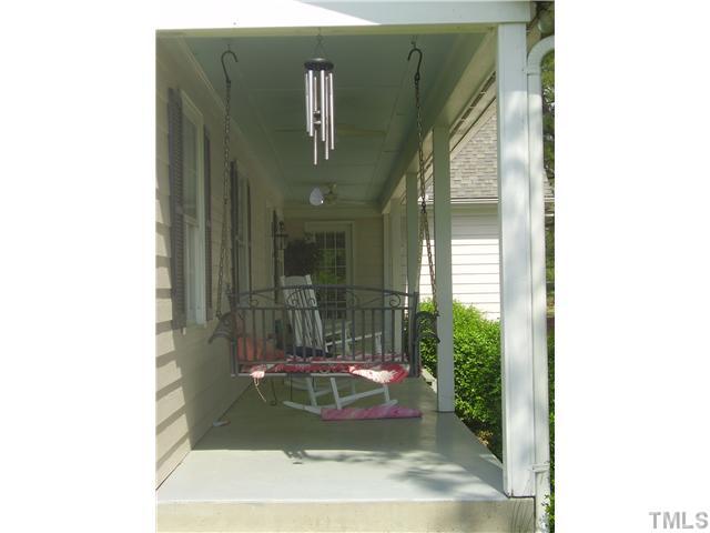 741 Gold Sand Road Louisburg, NC 27549 - Photo 23 of 25 Serenity is sipping morning coffee in your rocking chair