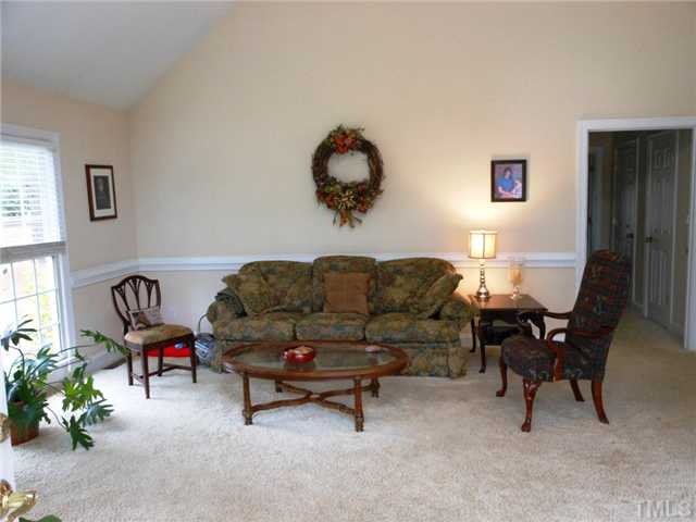 741 Gold Sand Road Louisburg, NC 27549 - Photo 9 of 25 Lots of windows to let the light shine in