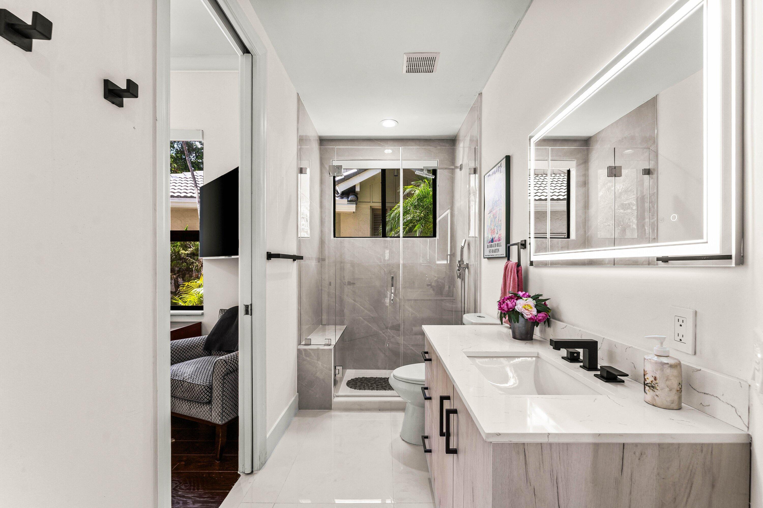 17541 Ashbourne Lane, Unit A Boca Raton, FL 33496 - Photo 19 of 78 Jack & Jill Bathroom