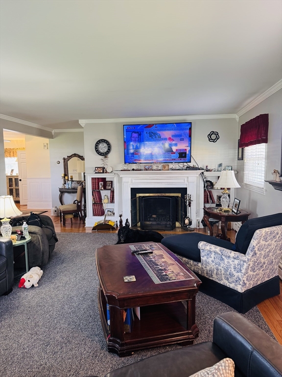 649 Stafford Road Fall River, MA 02721 - Photo 3 of 17 a living room with furniture and a fireplace