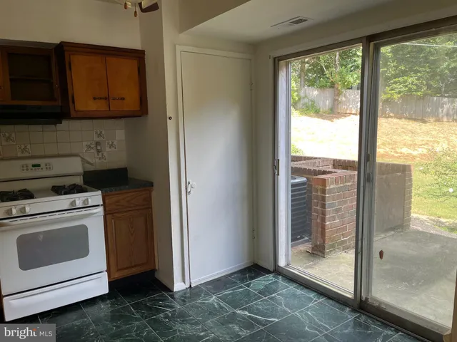 a view of a kitchen with a stove
