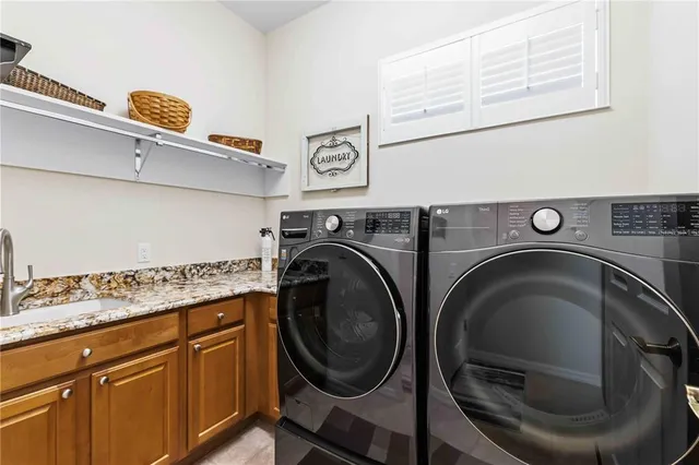 a bedroom with a bed and a dresser in it