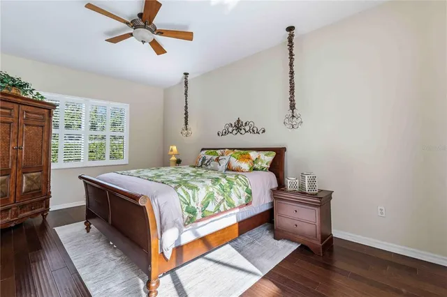 a spacious bathroom with a double vanity sink mirror and bathtub