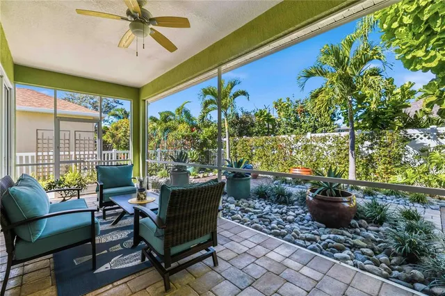 a potted plant sitting in front of a house
