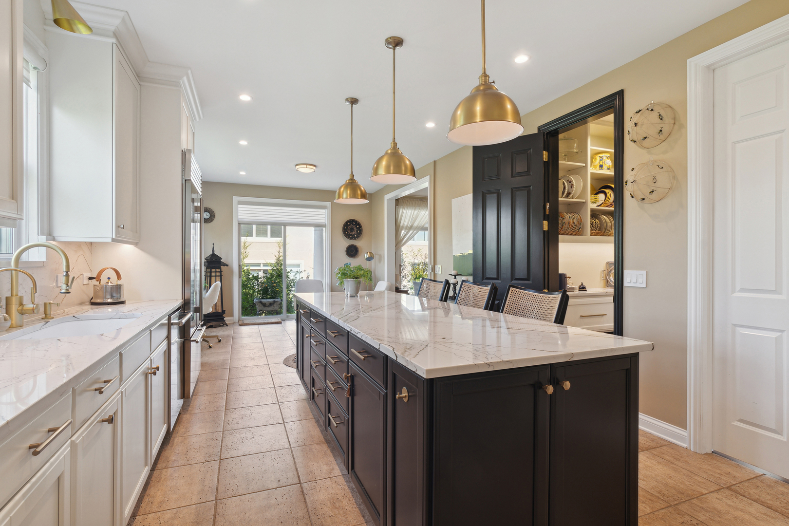 775 Endicott Road Highwood, IL 60040 - Photo 10 of 30 a large kitchen with kitchen island a large island in it
