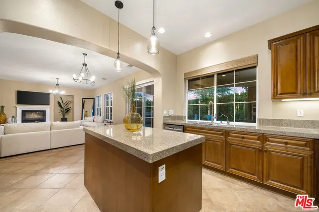a very nice looking dining room with a large window