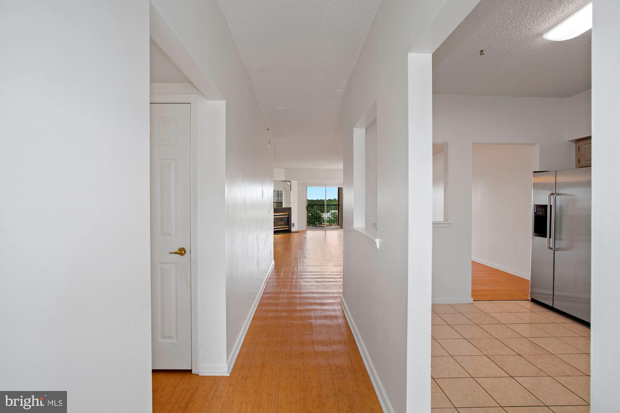 6250 Main Street Voorhees, NJ 08043 - Photo 2 of 28 a view of a hallway with a white walls