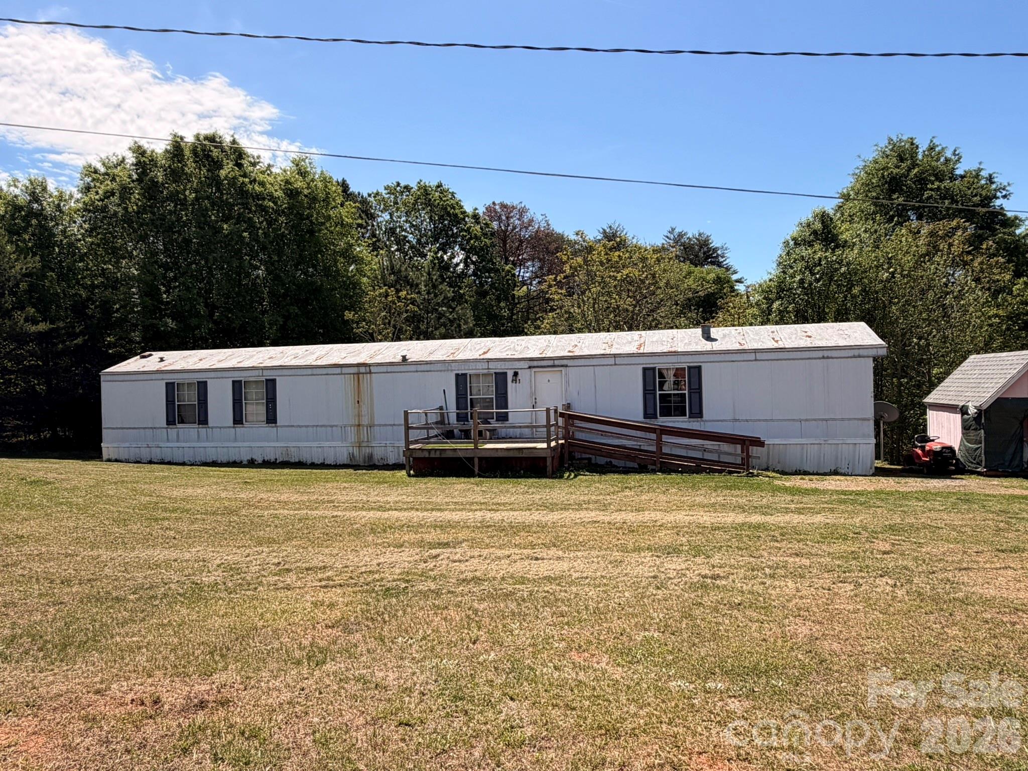 401 Webb Church Road Ellenboro, NC 28040 - Photo 1 of 21 a view of a house with a yard