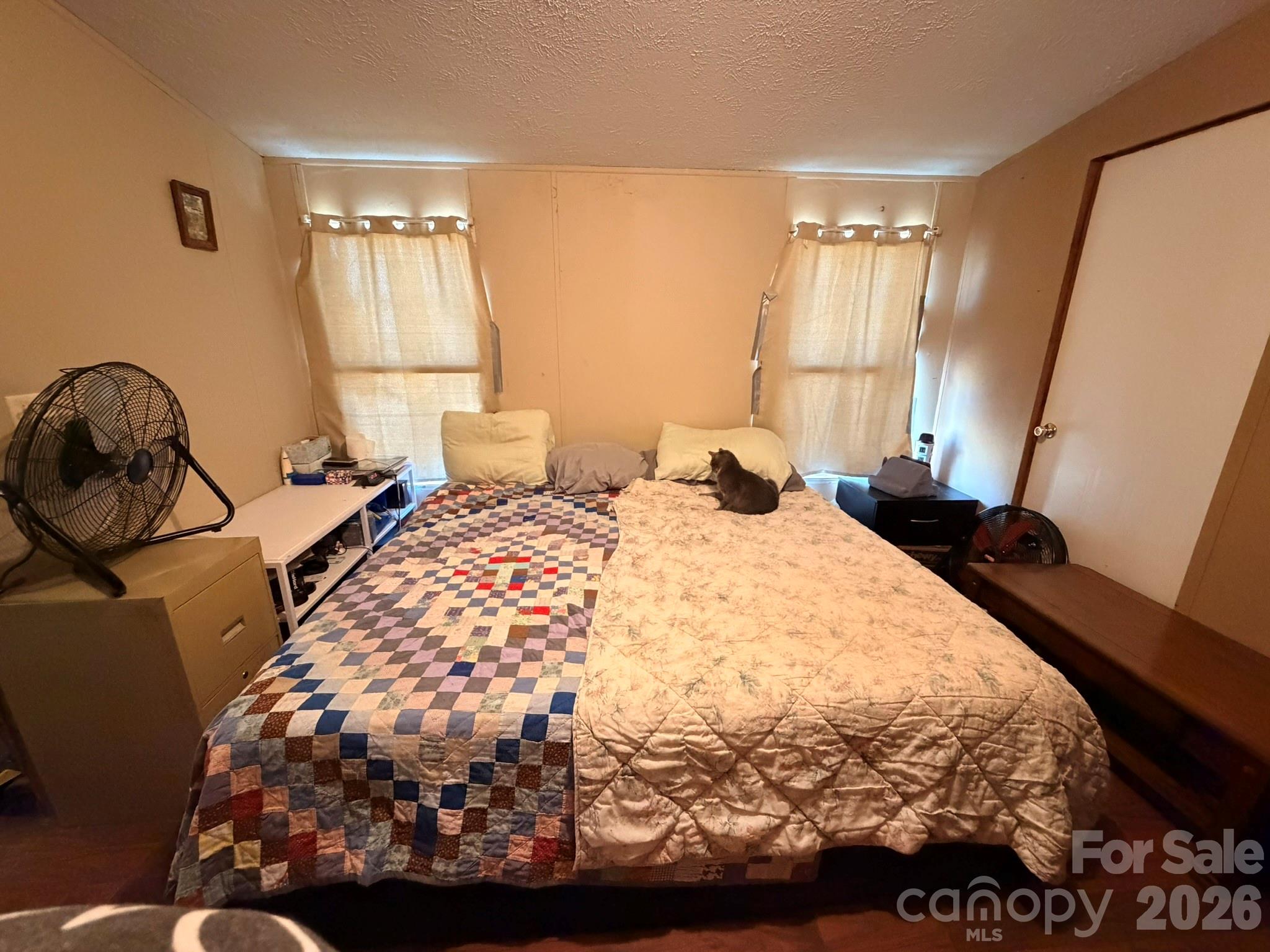 401 Webb Church Road Ellenboro, NC 28040 - Photo 12 of 21 a bedroom with a bed and window