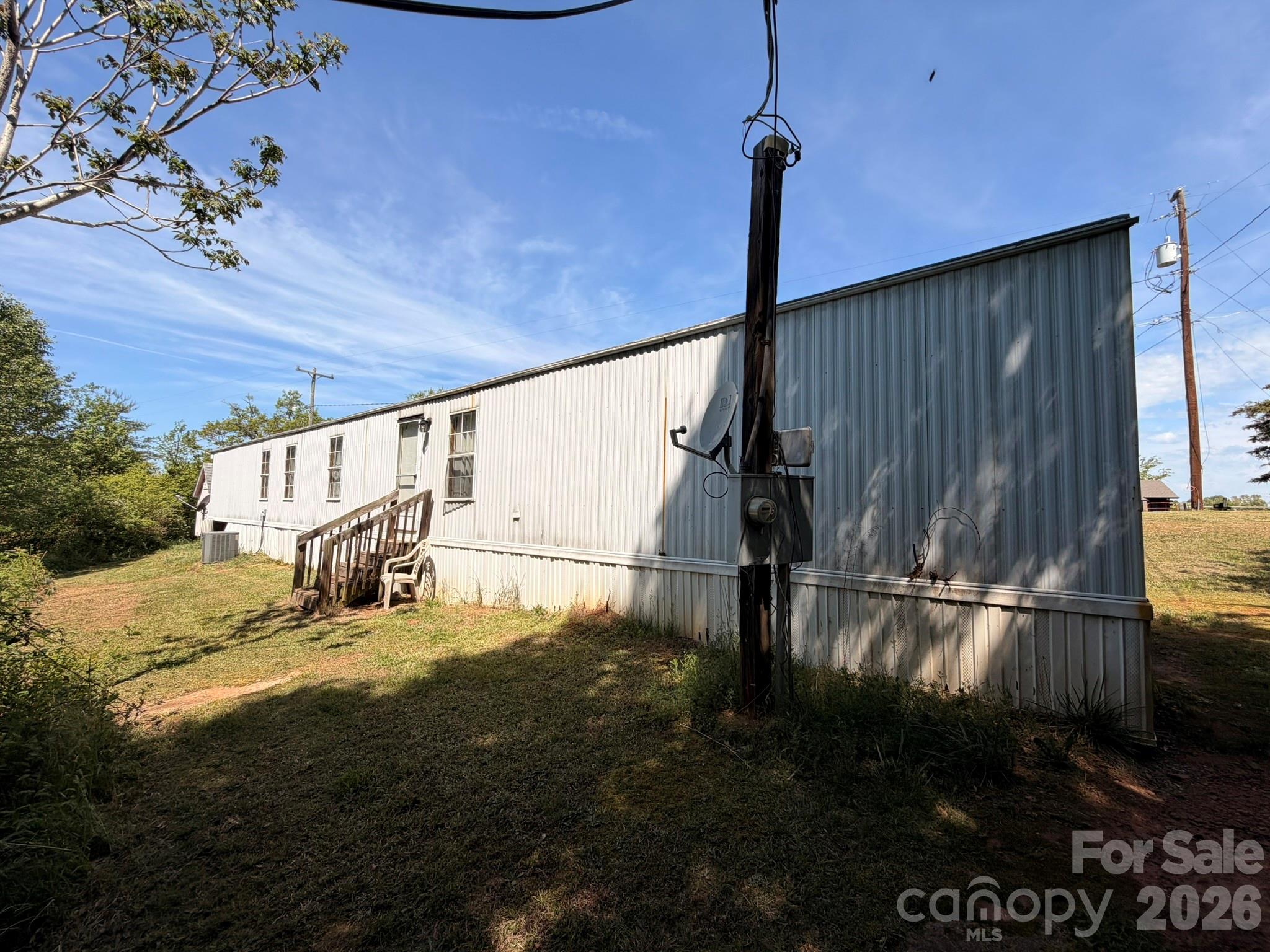 401 Webb Church Road Ellenboro, NC 28040 - Photo 20 of 21 a view of a house with backyard