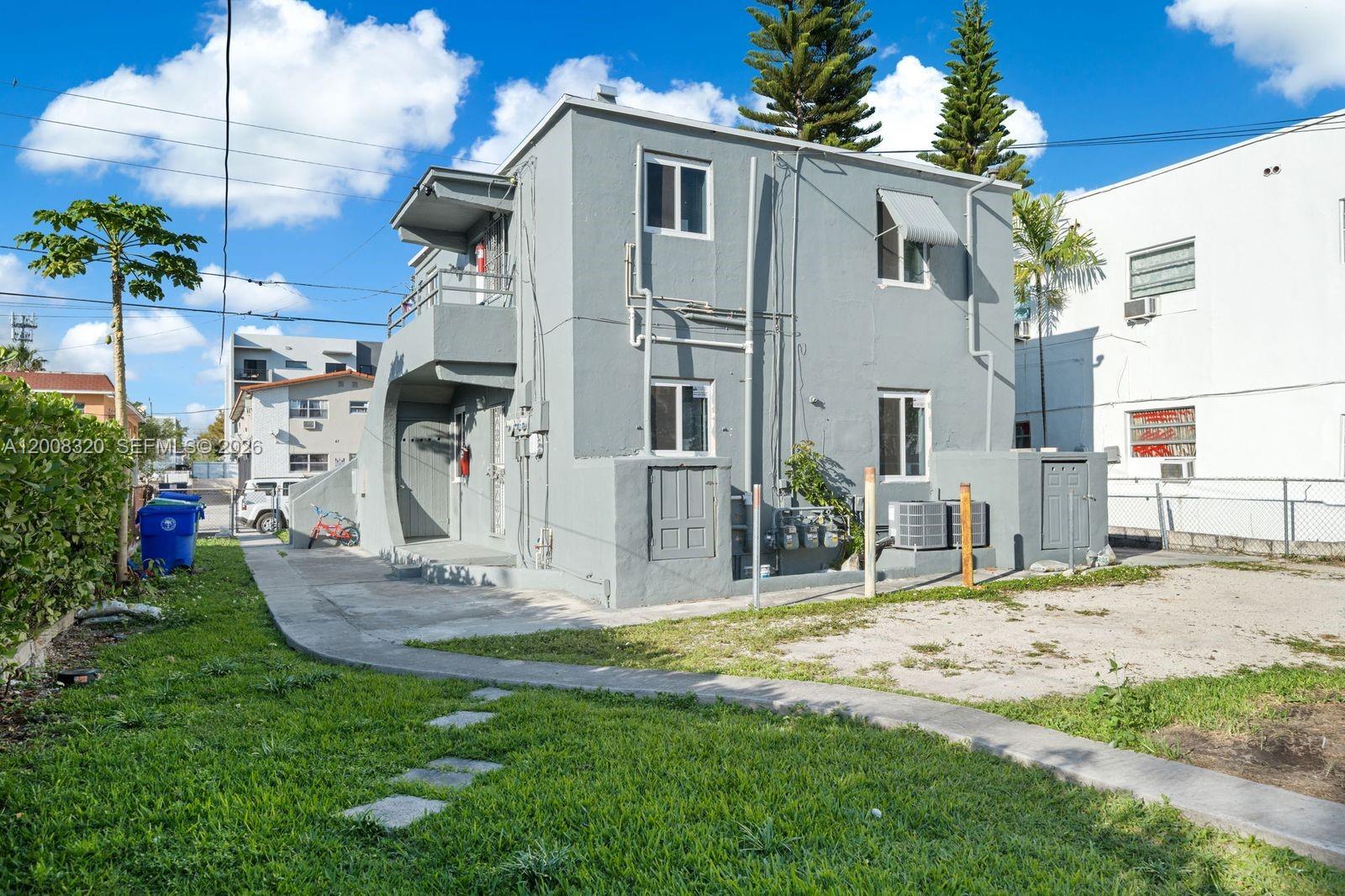 842 Southwest 3rd Street Miami, FL 33130 - Photo 4 of 13 a view of a house with backyard