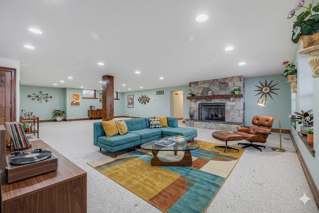 1821 Museum Road Wyomissing, PA 19610 - Photo 51 of 68 a living room with furniture and a fireplace