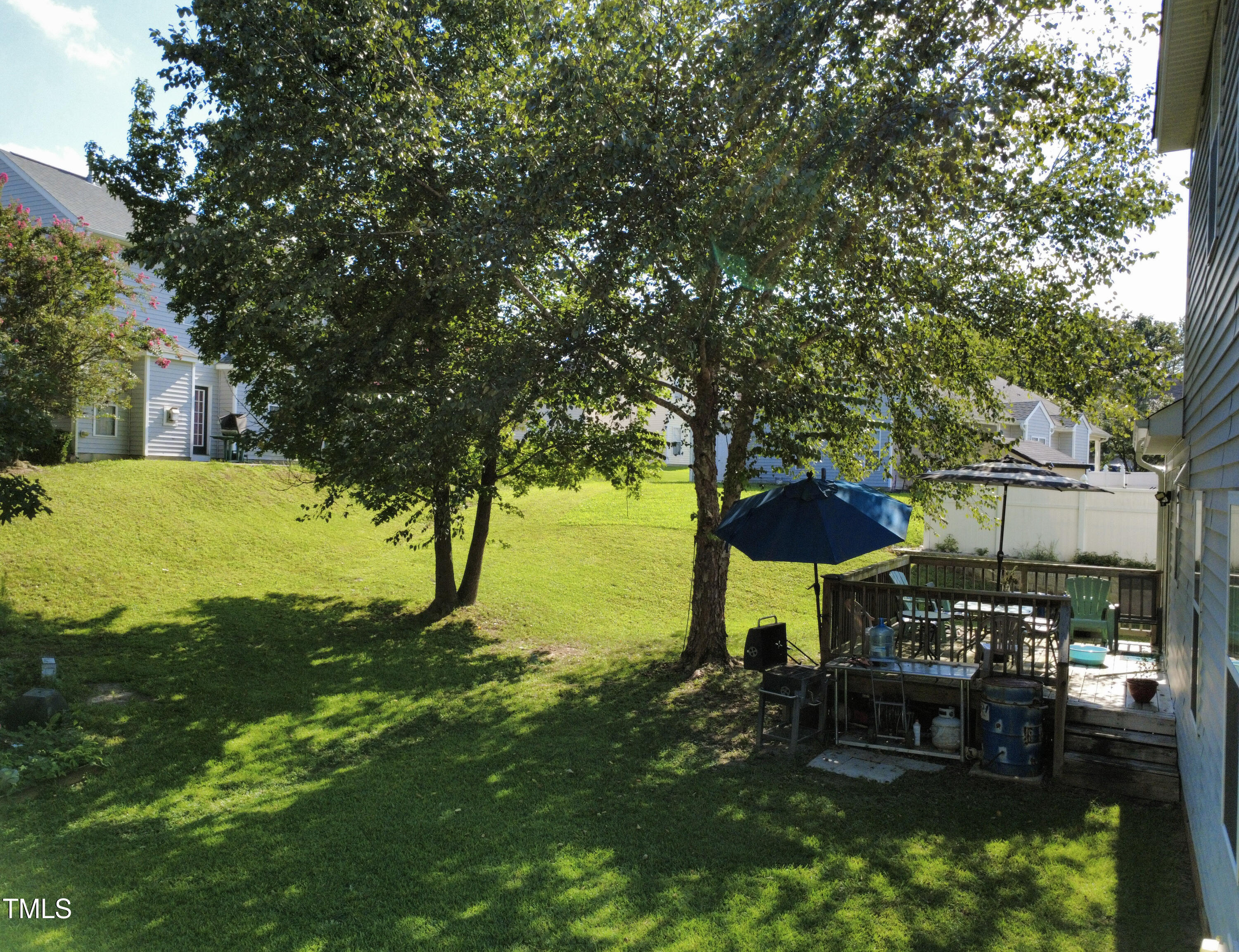 2704 Hope Diamond Court Raleigh, NC 27610 - Photo 10 of 12 a view of a bench in a garden