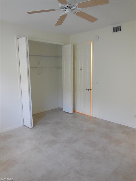 1265 Egrets Landing, Unit 101 Naples, FL 34108 - Photo 25 of 28 a view of an empty room