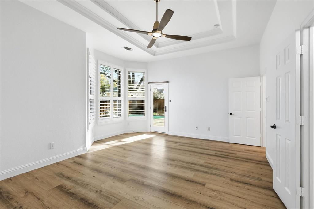 3408 Druid Way Flower Mound, TX 75028 - Photo 18 of 36 wooden floor in an empty room with a window