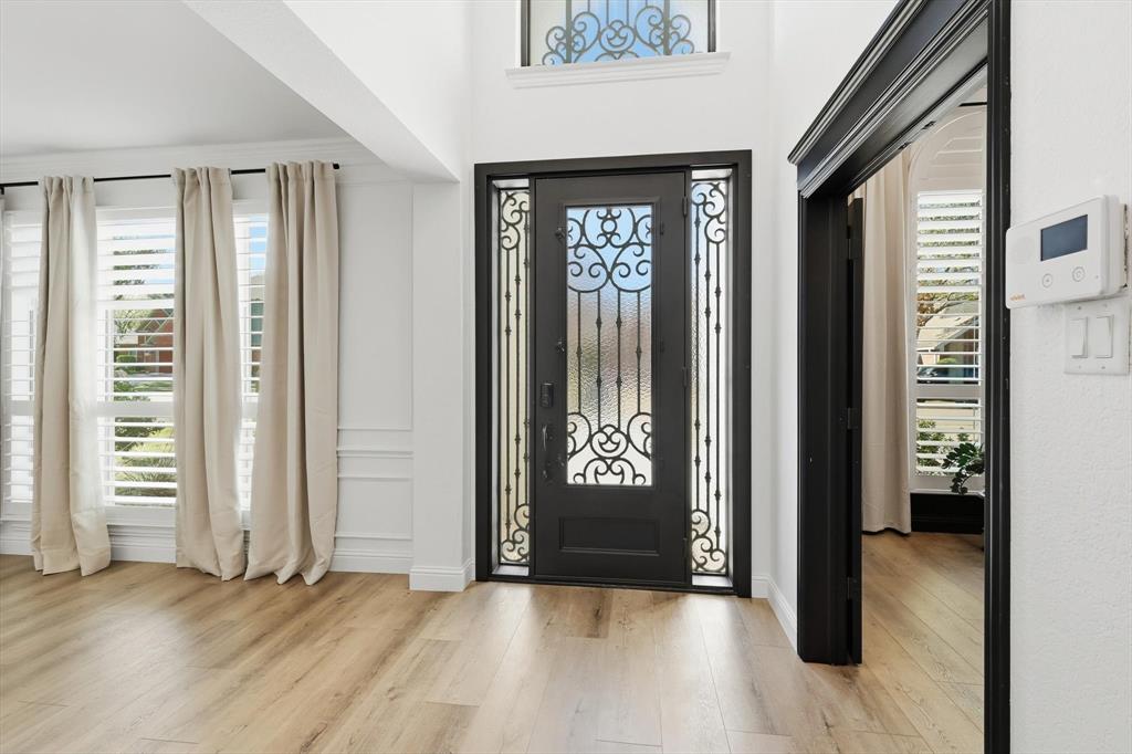 3408 Druid Way Flower Mound, TX 75028 - Photo 5 of 36 an empty room with windows and closet