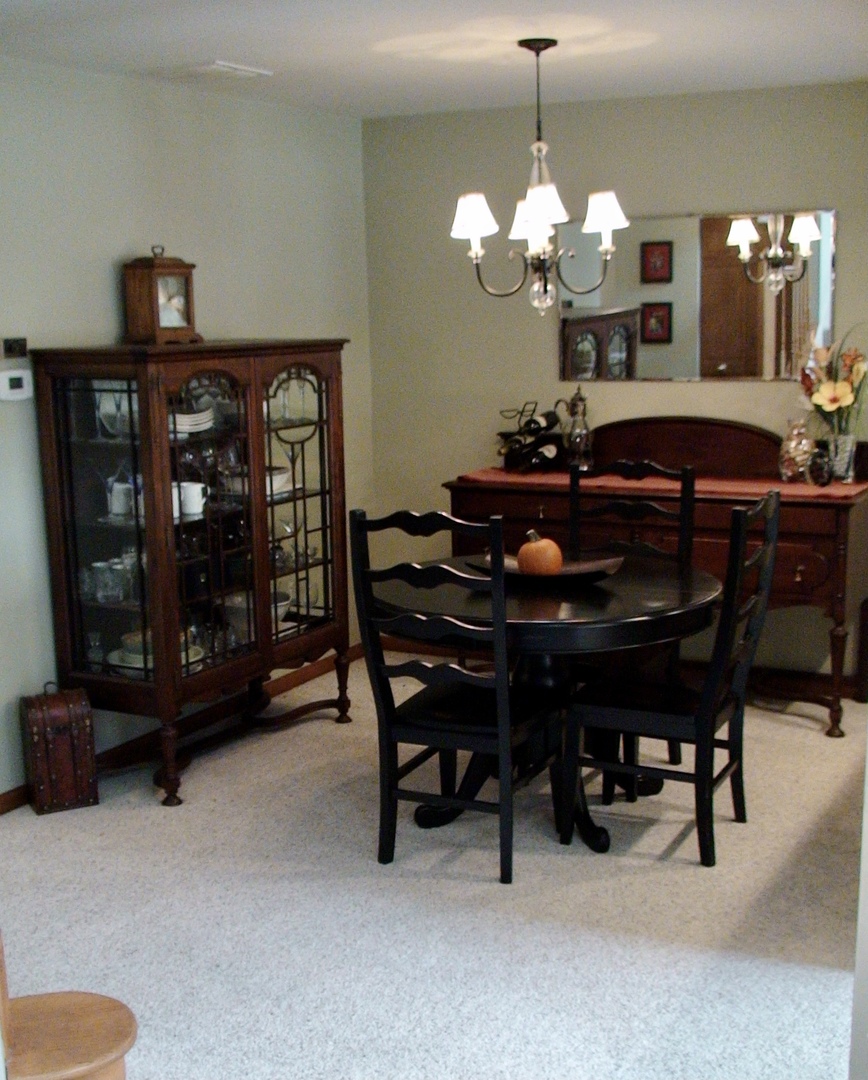 2008 North Silver Lake Road Arlington Heights, IL 60004 - Photo 6 of 17 a dining room with furniture and chandelier