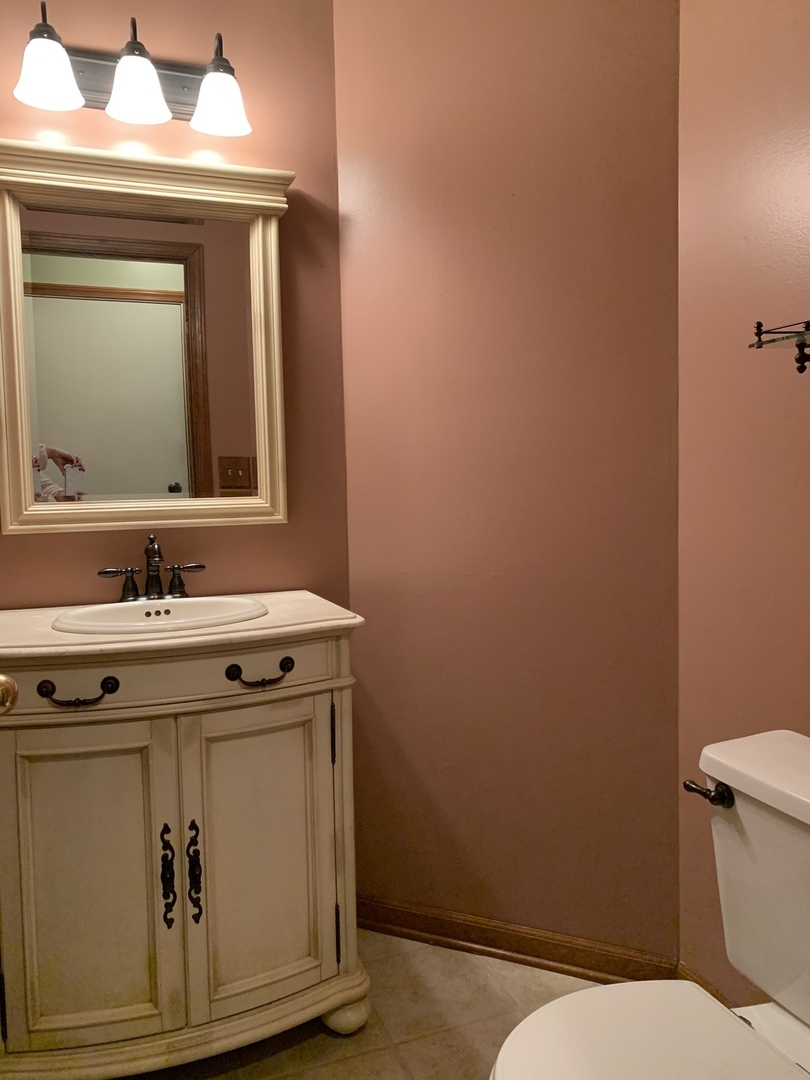 2008 North Silver Lake Road Arlington Heights, IL 60004 - Photo 7 of 17 a bathroom with a sink and a toilet