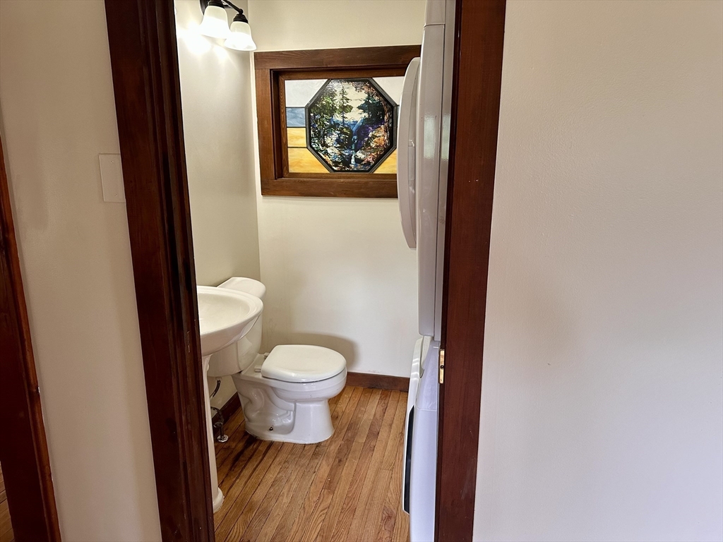 7 Grout Road Hawley, MA 01339 - Photo 8 of 33 a bathroom with a toilet and a painting on the wall