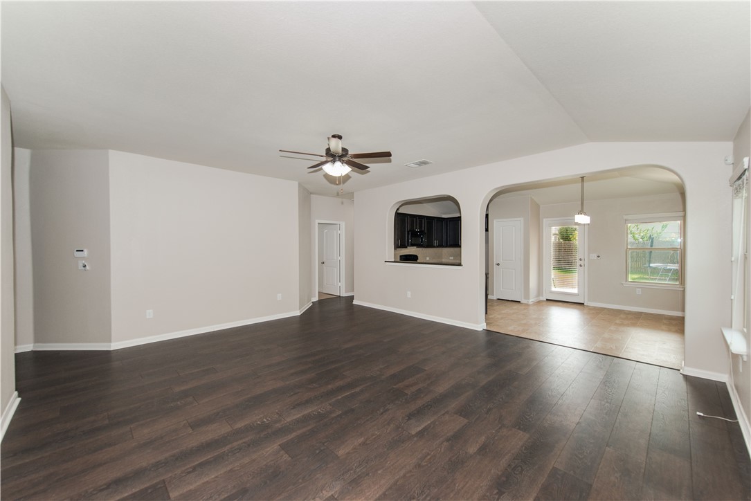 1007 Plateau Trail Georgetown, TX 78626 - Photo 4 of 32 a view of a room with wooden floor