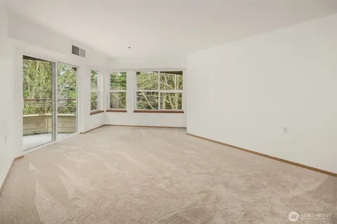 an empty room with a large window