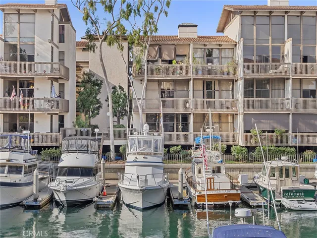 a swimming pool view with a outdoor seating