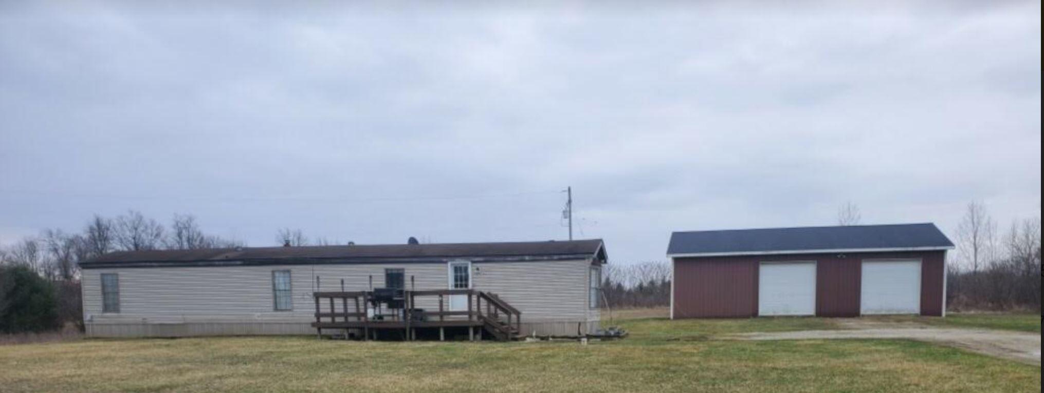 3387 Huff Road Osseo, MI 49266 - Photo 1 of 16 Main