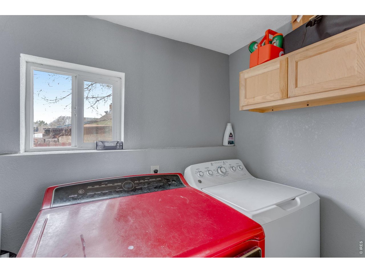 403 9th Avenue Greeley, CO 80631 - Photo 18 of 19 a bedroom with a bed and a window