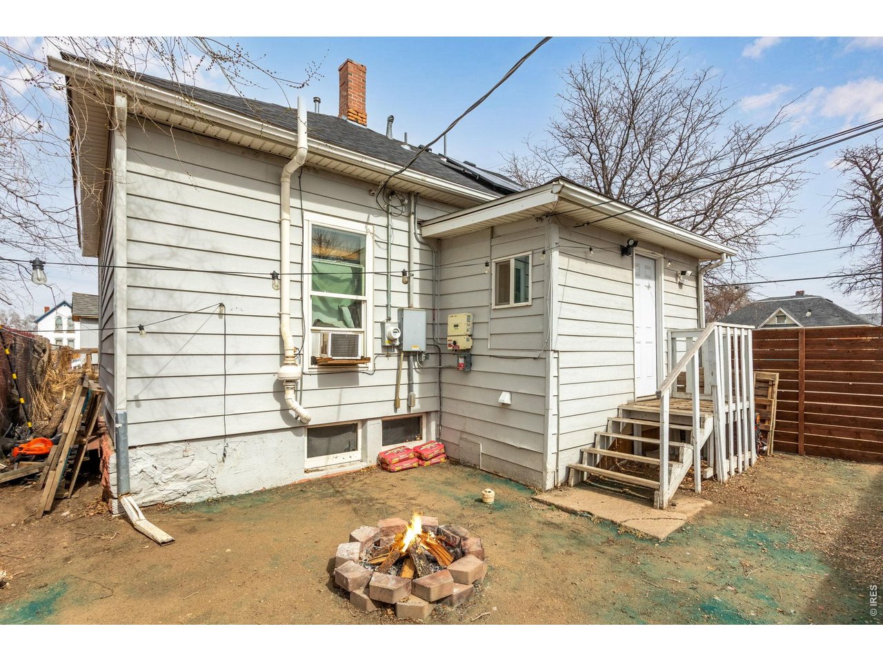 403 9th Avenue Greeley, CO 80631 - Photo 19 of 19 a view of a house with a yard