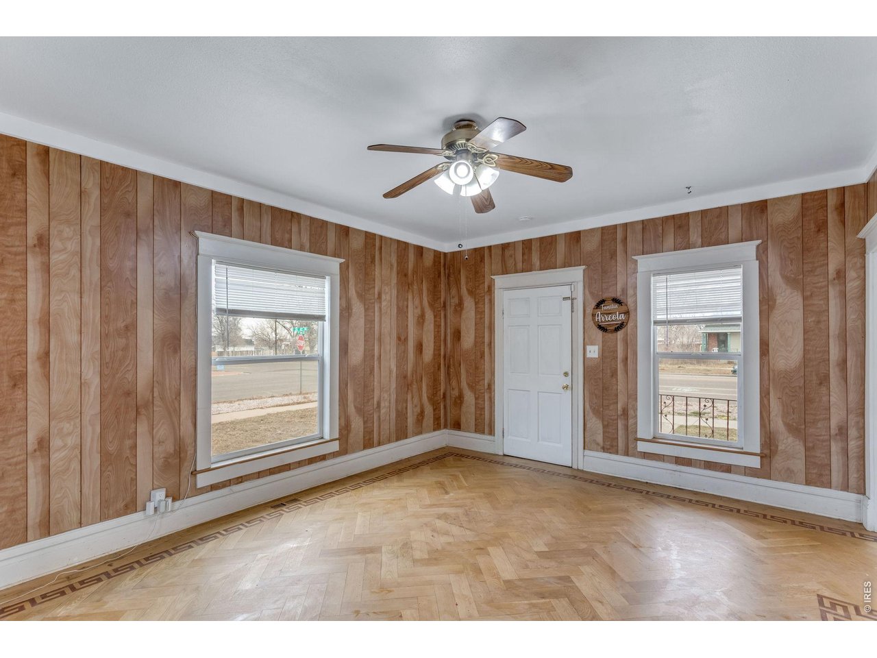 403 9th Avenue Greeley, CO 80631 - Photo 6 of 19 a view of empty room with windows