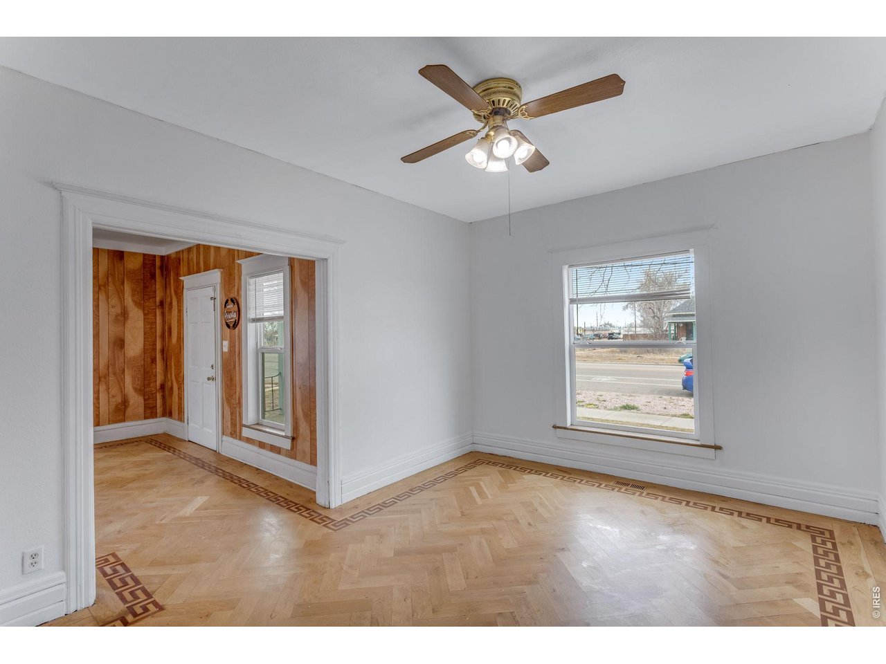 403 9th Avenue Greeley, CO 80631 - Photo 9 of 19 a view of an empty room and window