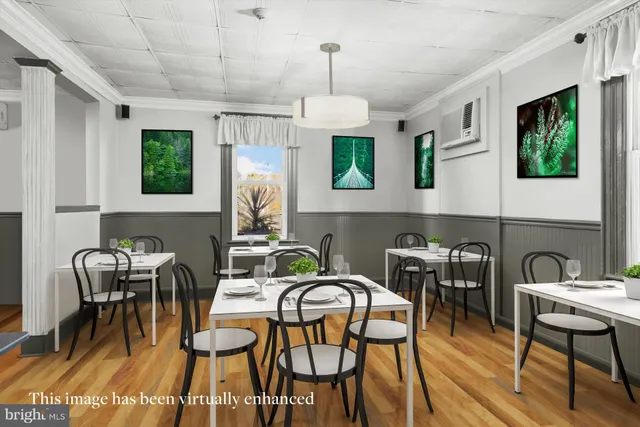 a dining room with furniture and window