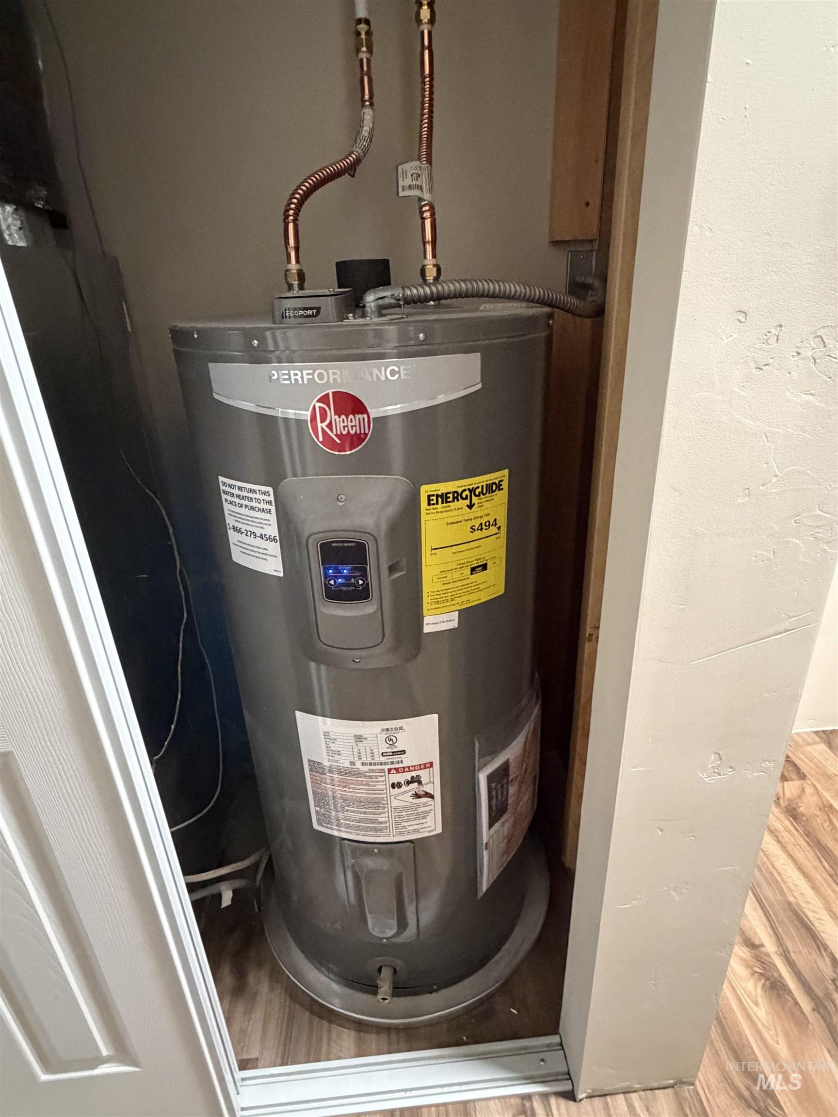 815 East Liberty Street Weiser, ID 83672 - Photo 20 of 25 Utility room featuring water heater