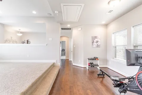 a view of a living room and dining room
