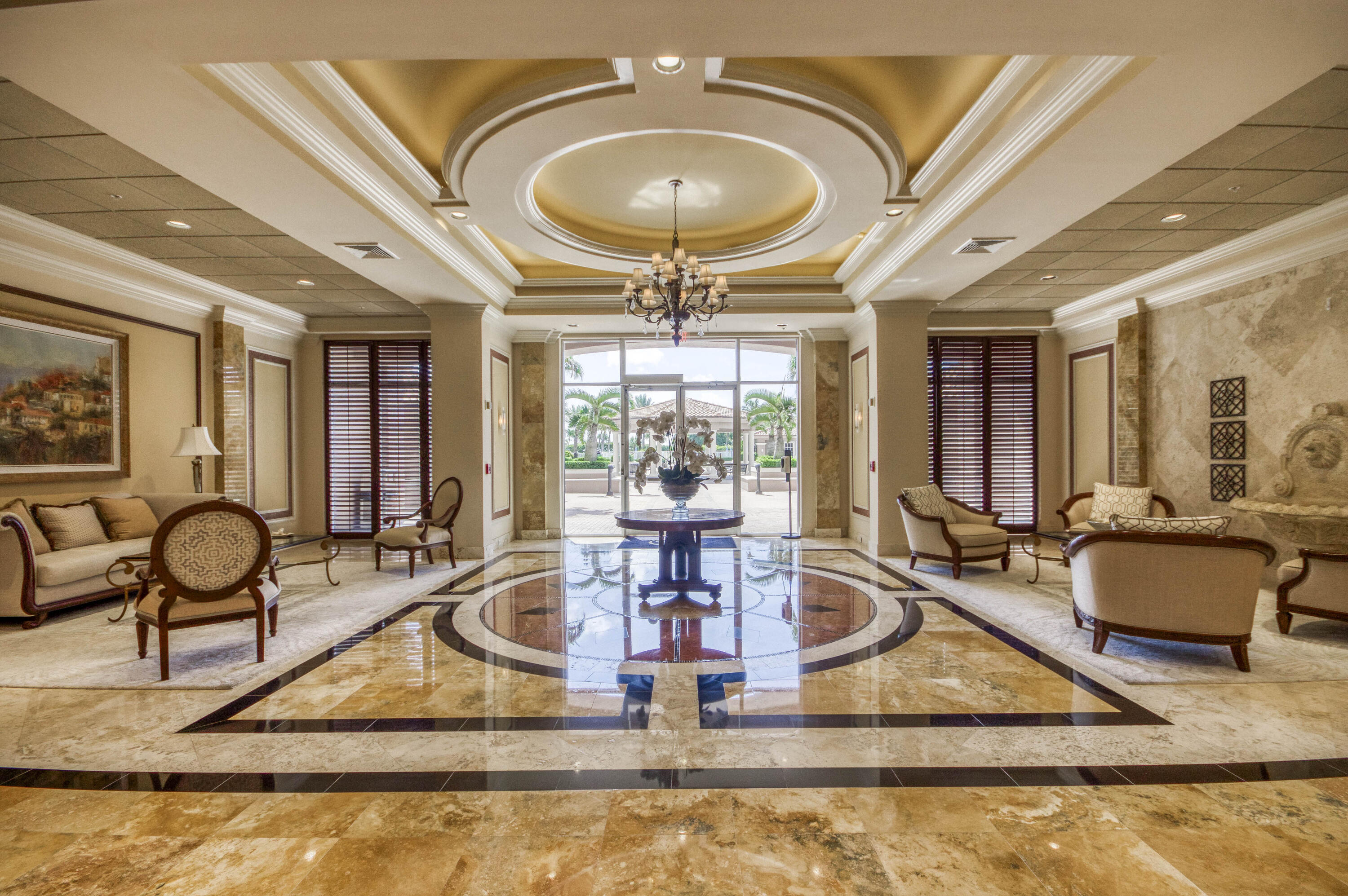 700 Ocean Royale, Unit 202 Juno Beach, FL 33408 - Photo 25 of 34 a living room with furniture and a large window