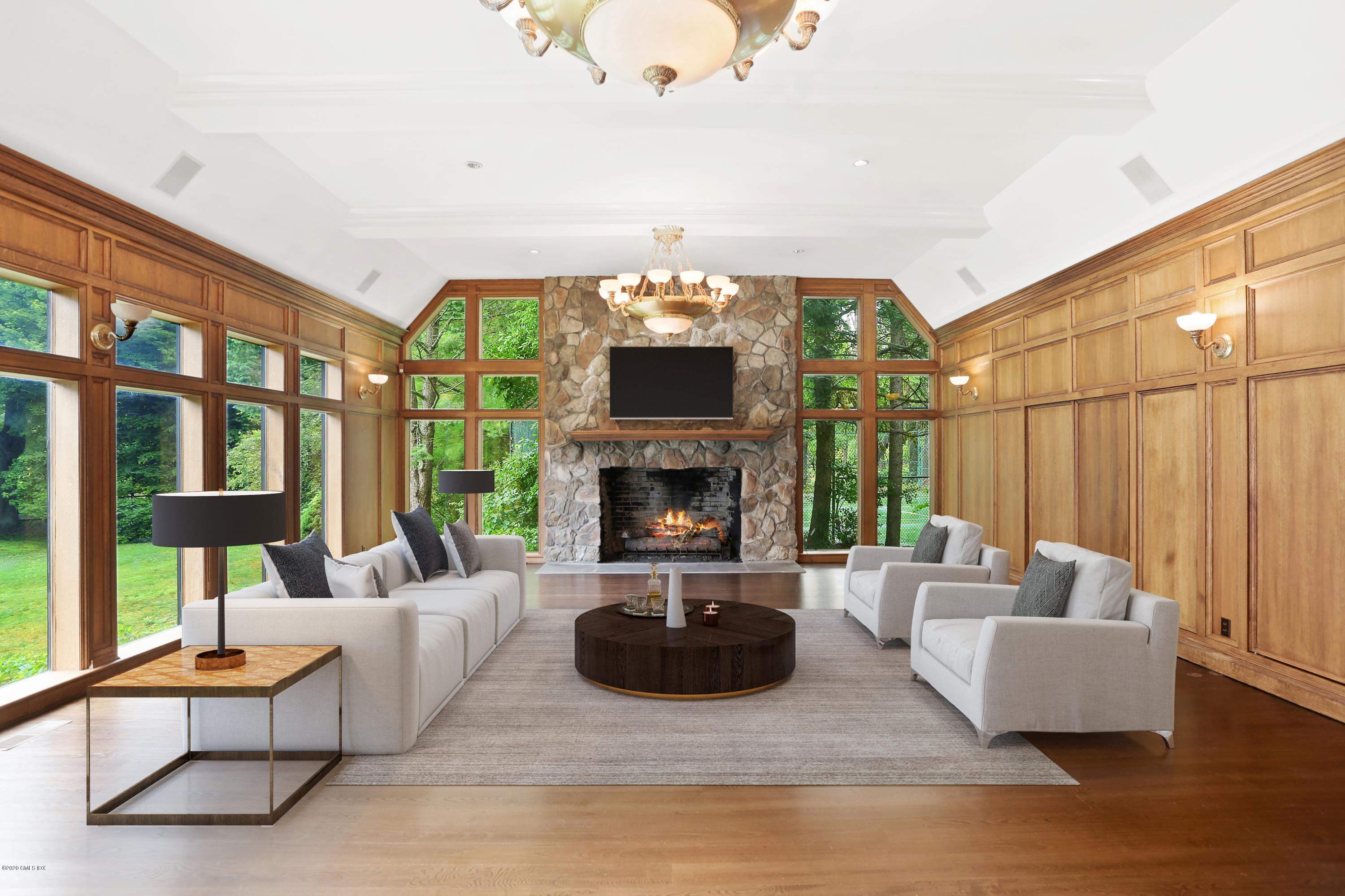 558 Lake Avenue Greenwich, CT 06830 - Photo 13 of 28 a living room with furniture and a fireplace