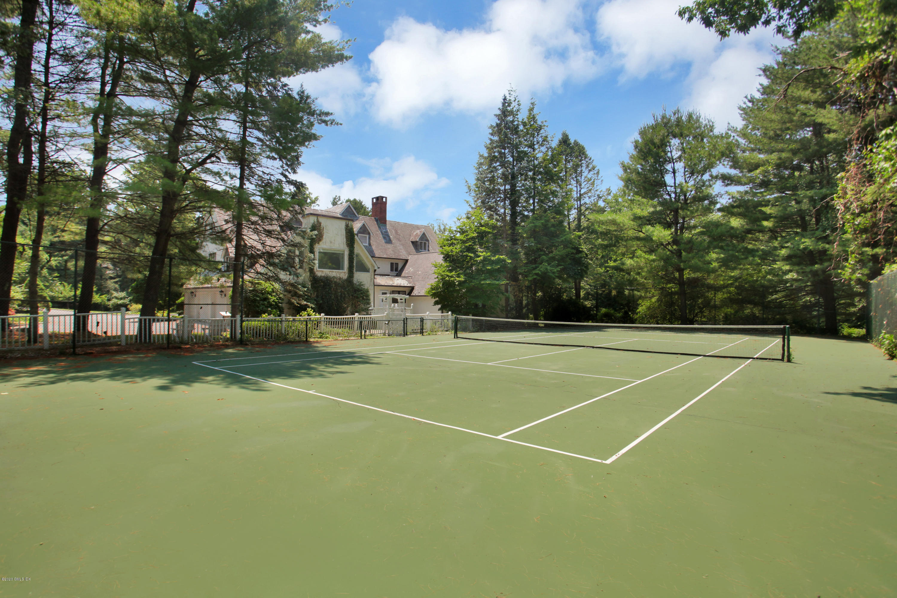 558 Lake Avenue Greenwich, CT 06830 - Photo 23 of 28 a view of a tennis court