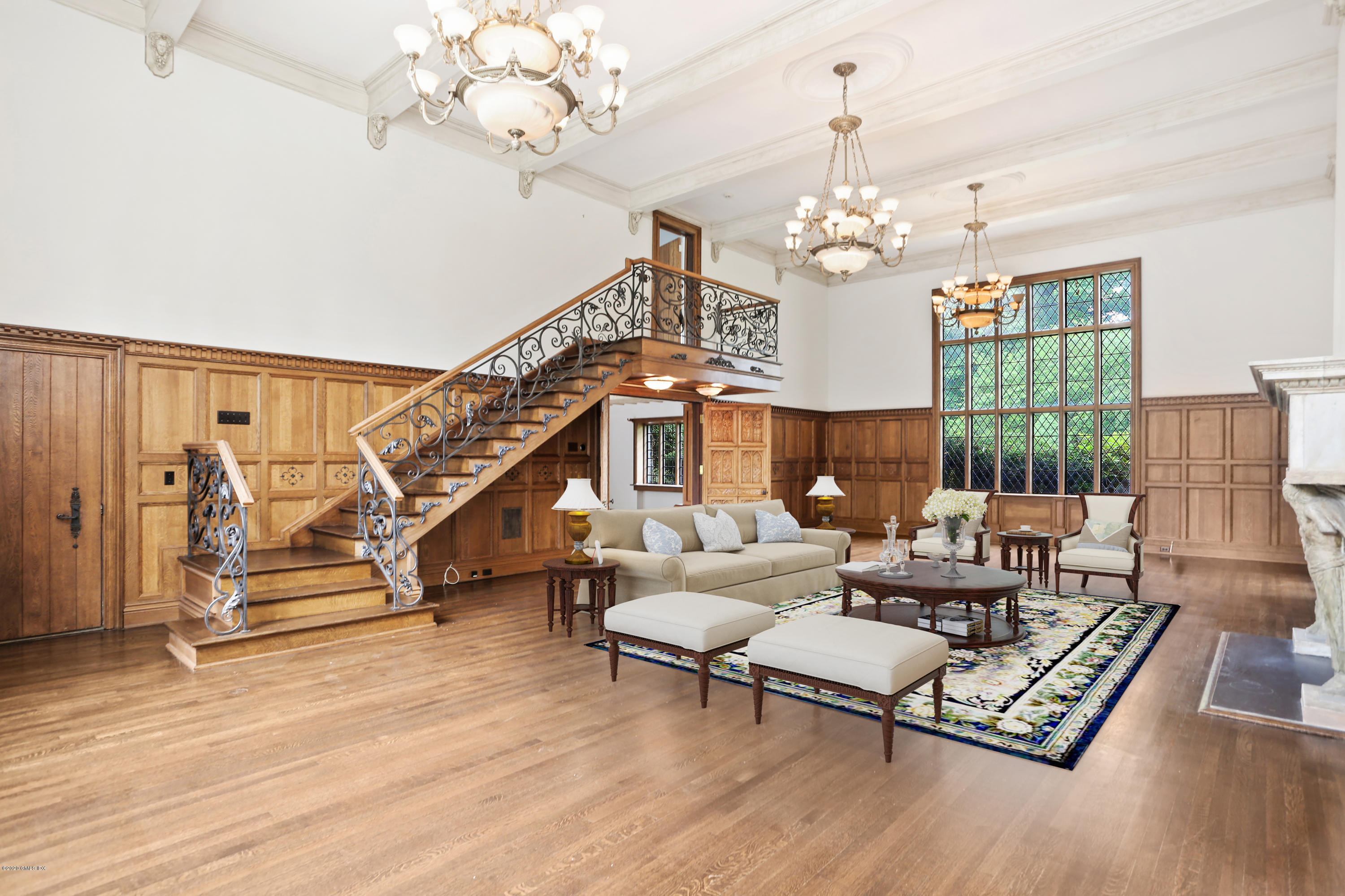 558 Lake Avenue Greenwich, CT 06830 - Photo 8 of 28 a living room with furniture chandelier and a wooden floor