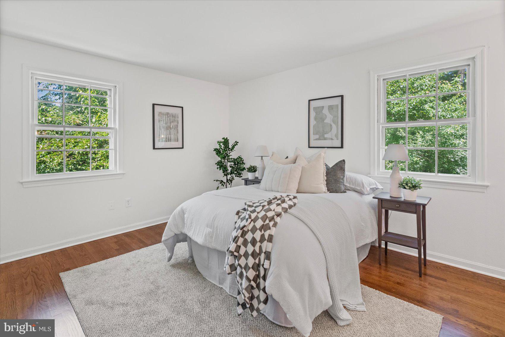 2300 Musgrove Road Silver Spring, MD 20904 - Photo 14 of 41 a bedroom with a large bed and a window
